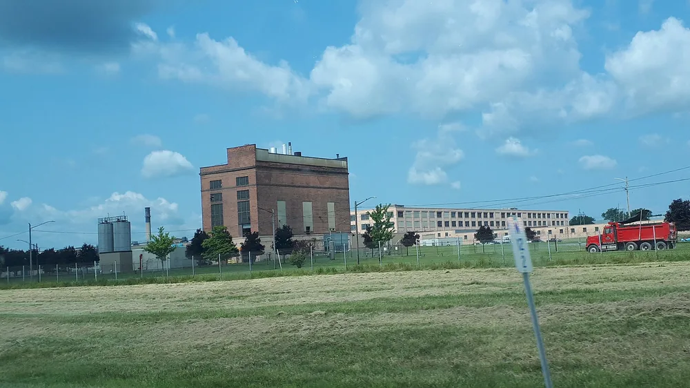 The Sumitomo Rubber plant in Tonawanda, New York, seen from I-290 in 2023; it built Dunlop and Falken tires for the US market until it closed in 2025.